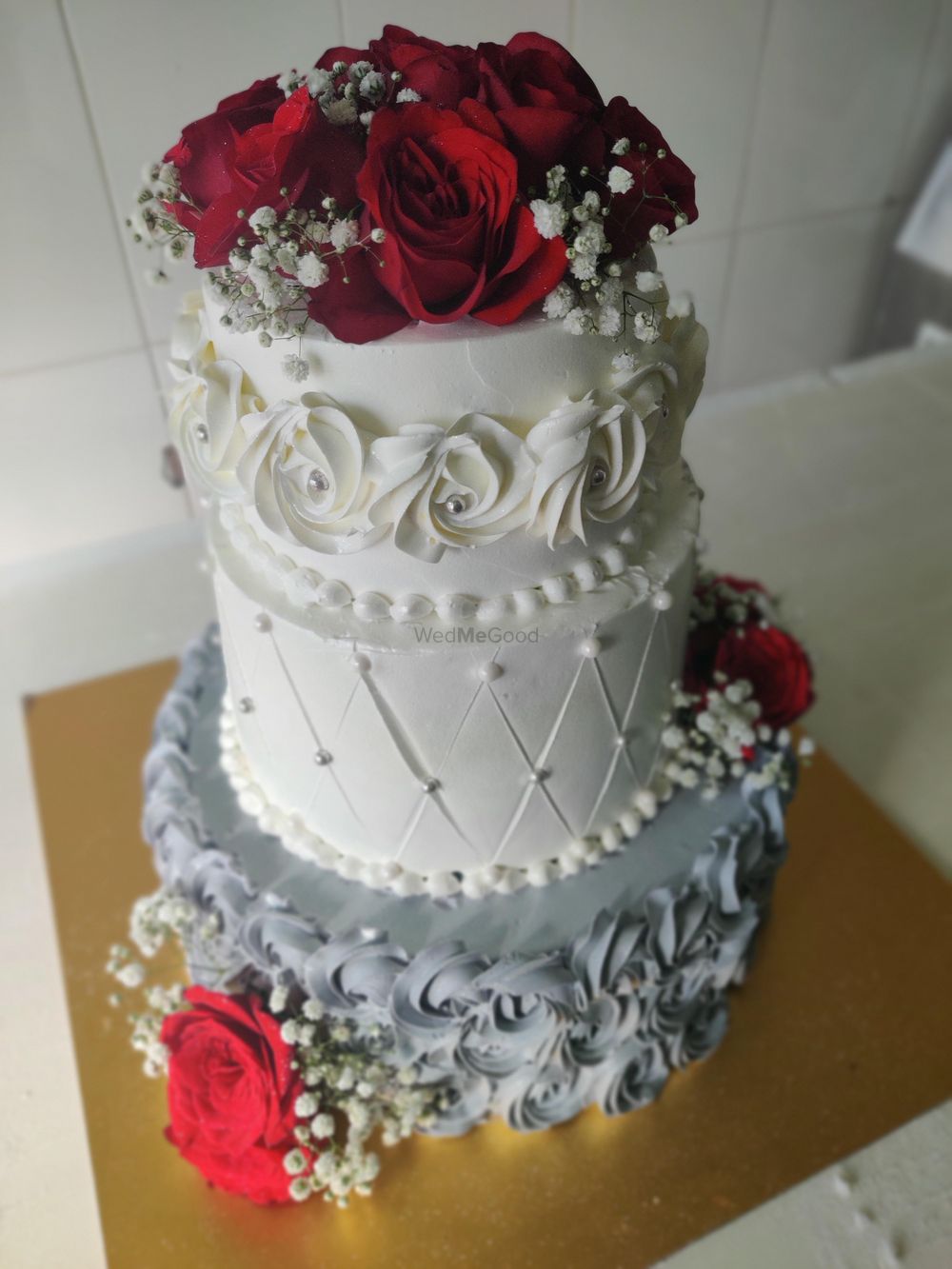 Photo From grey red and white theme cake - By Nicky's Cafe and Fine Pastries