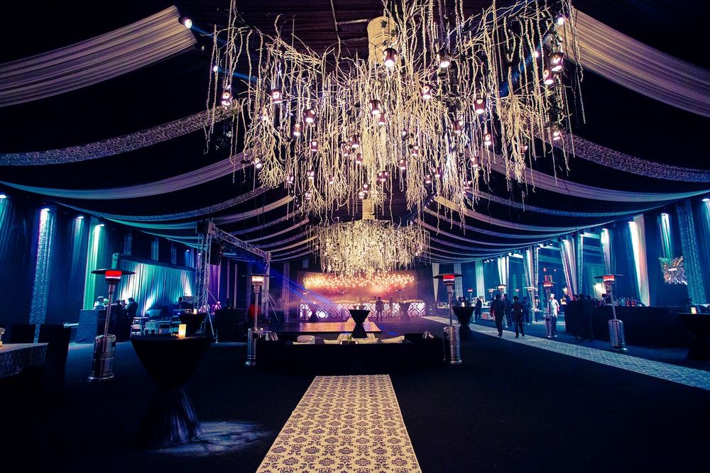 Photo of glamorous club look theme with large chandeliers