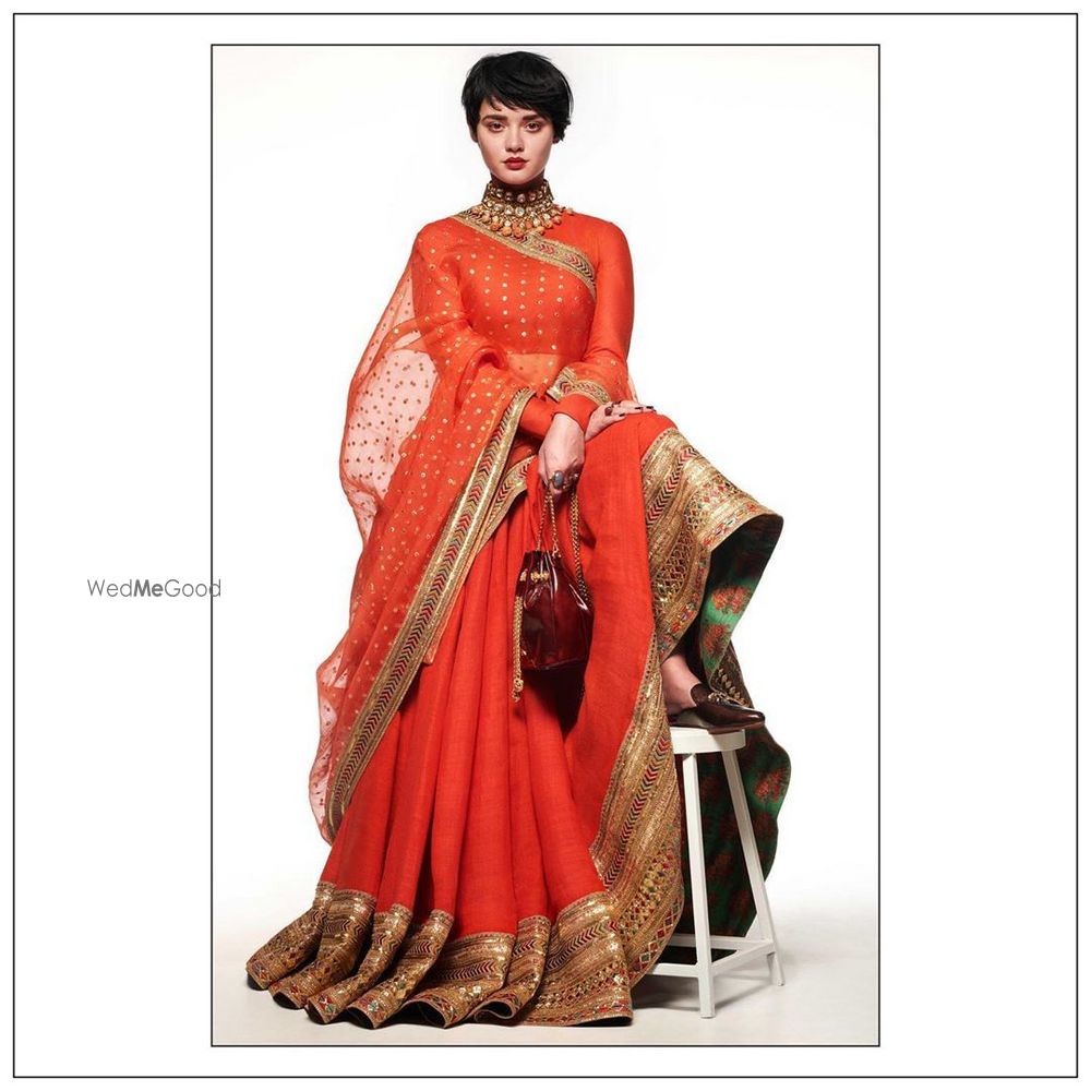 Photo of Madras Mehendi Bridal Lehenga Carried Beautifully with Sabyasachi Heritage Jewellery Collection.