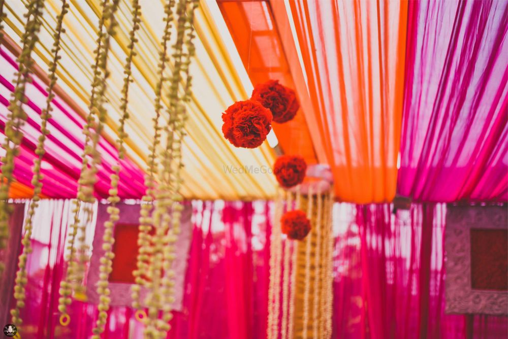 Photo of Hanging Floral Arrangement with Orange and Pink Decor