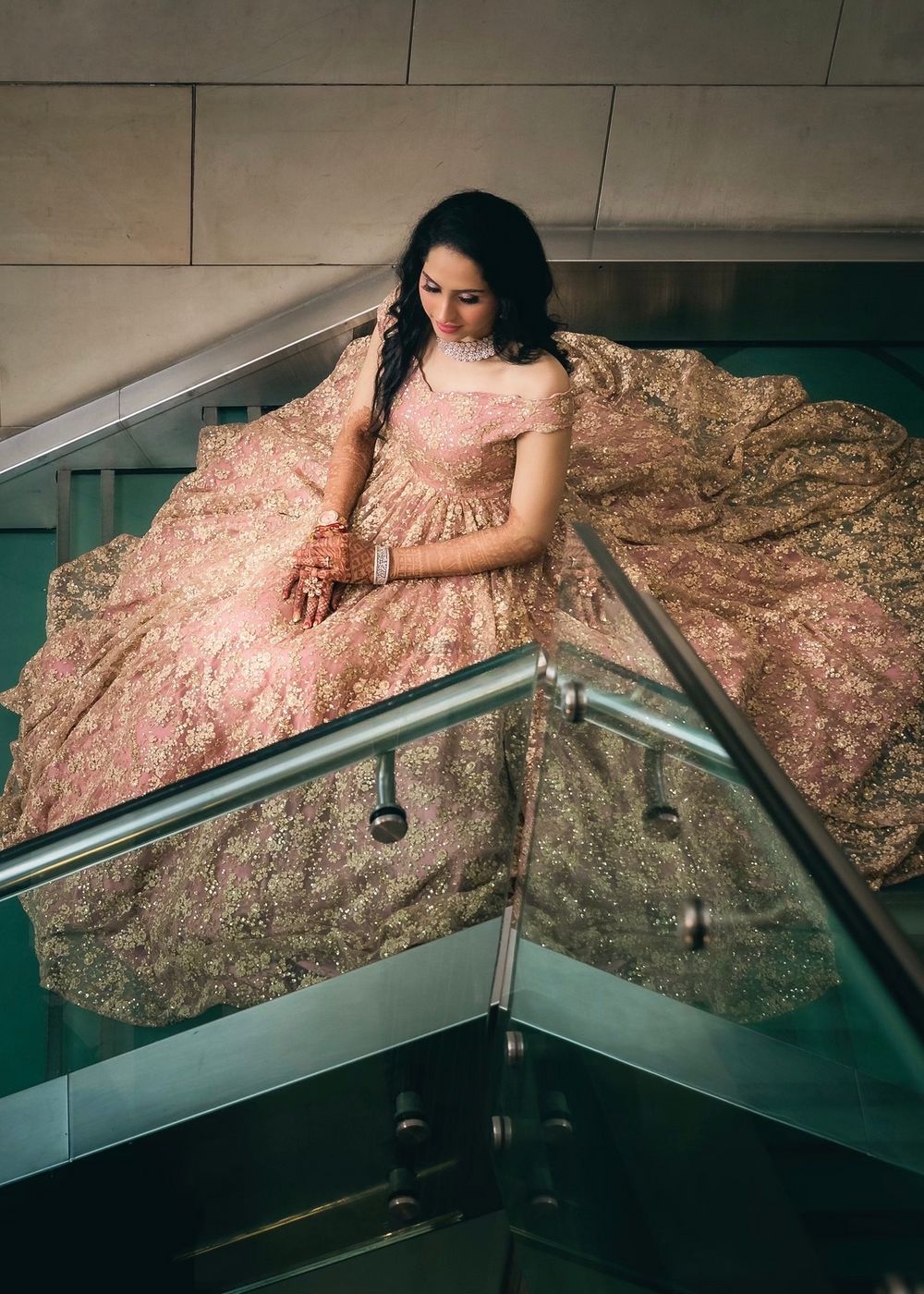 Photo of light pink and gold flared cocktail gown
