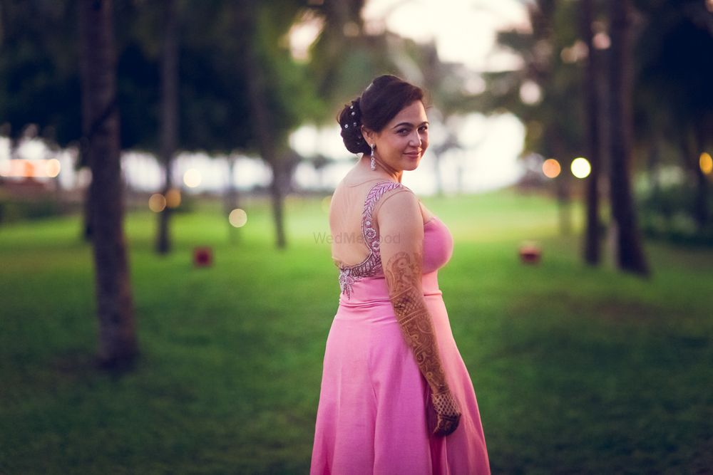 Photo of Bride Wearing Light Pink Gown with Silver Stone Work
