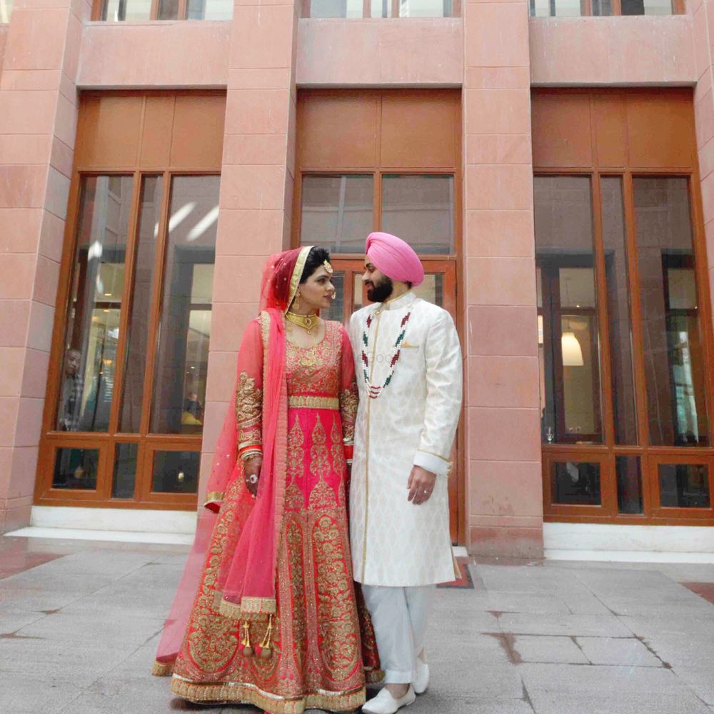 Photo of Sikh Bride Wearing Pink and Gold Anarkali
