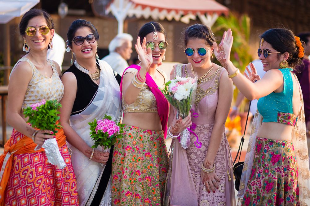 Photo of Destination Wedding Bridesmaids Wearing Sunglasses