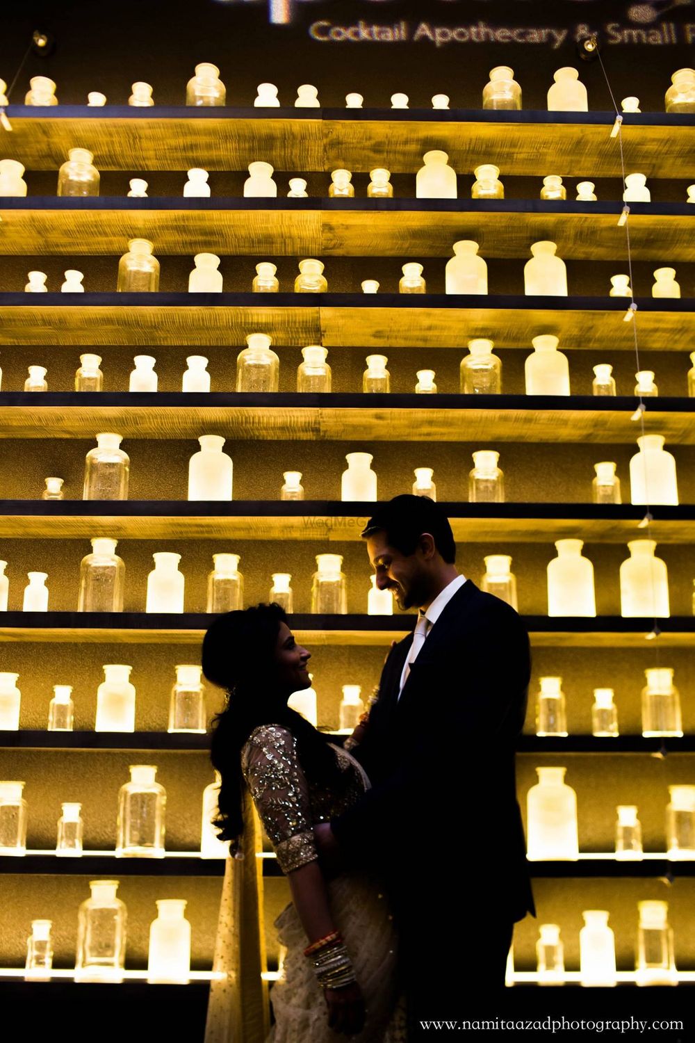 Photo of Unique Decor with Lights in Jars on Shelves
