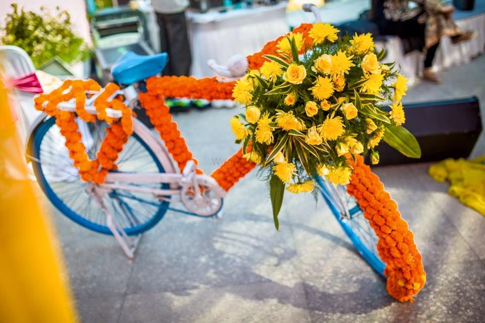 Photo of Genda Phool Cycle with Floral Arrangement Decor Prop