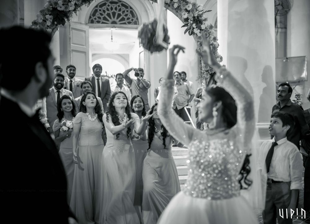 Photo of Black and White Christian Wedding Bouquet Toss