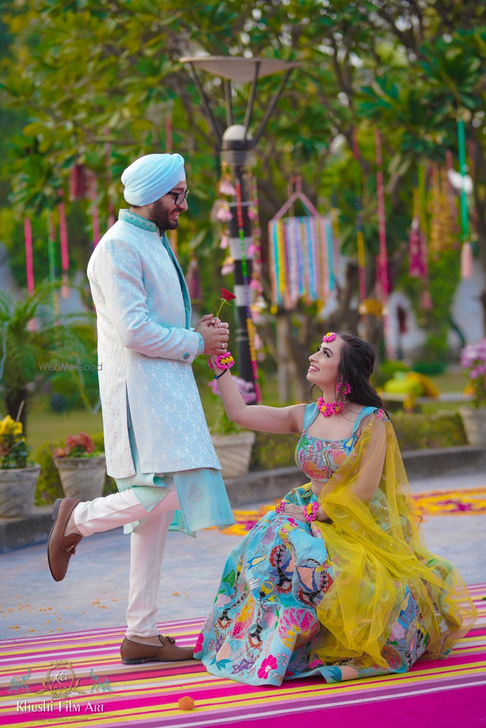 Photo of An adorable couple shot of a bride proposing the groom.