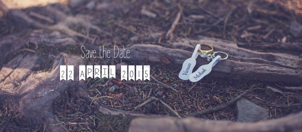 Photo of save the date shot with engagement rings