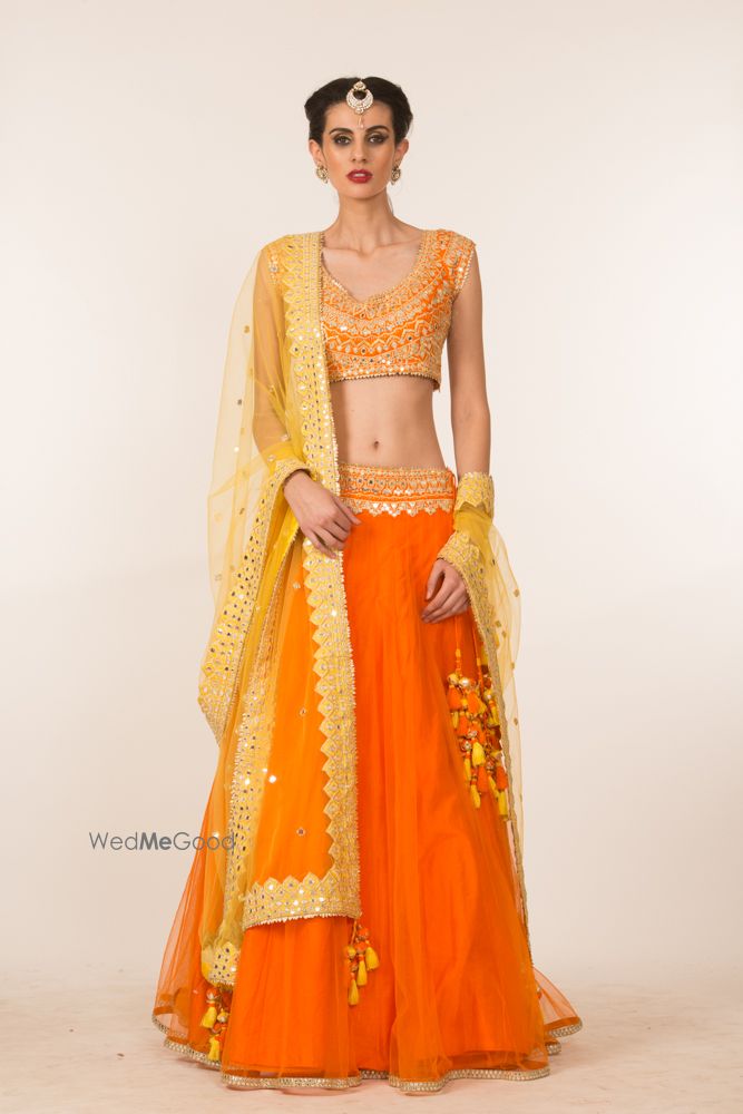 Photo of Montone Orange and Gold Light Lehenga with Gota Work