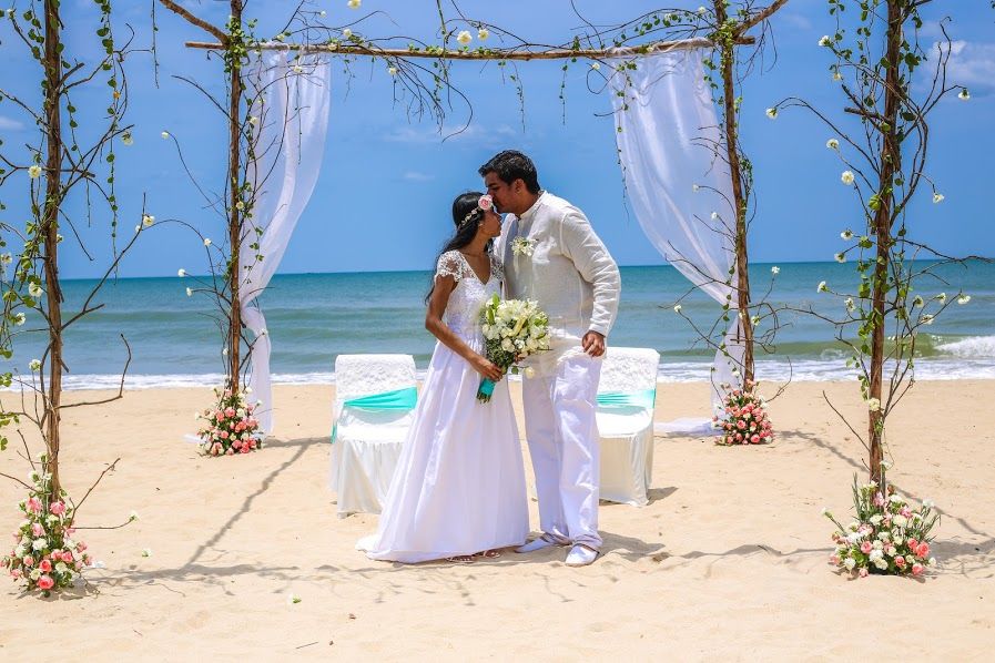 Photo of Rustic Beach Wedding Mandap with Simple Florals