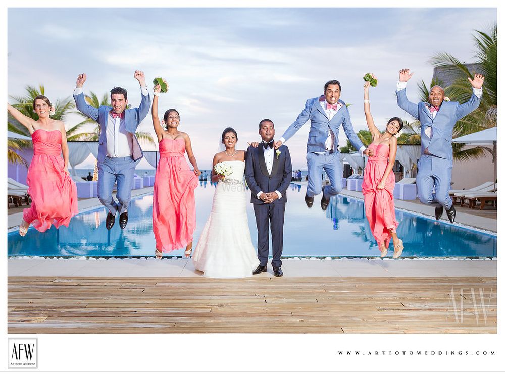 Photo of Fun Photo with Bridesmaids and Groomesmen Jumping