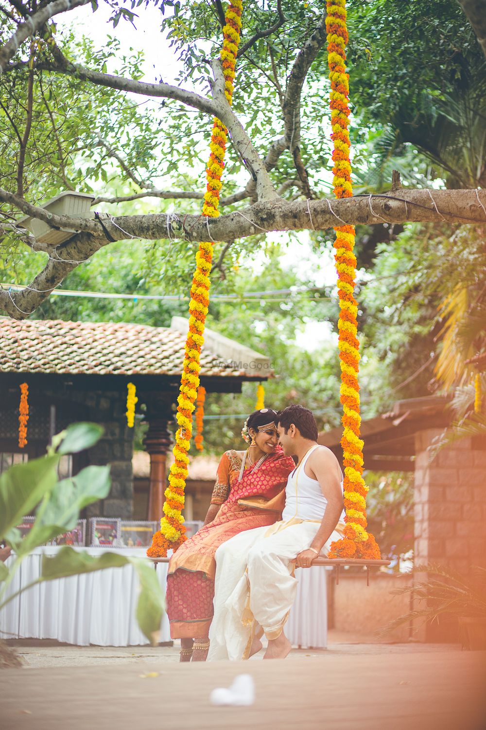 Photo of Rustic Swing with Genda Phool Decor in South Wedding