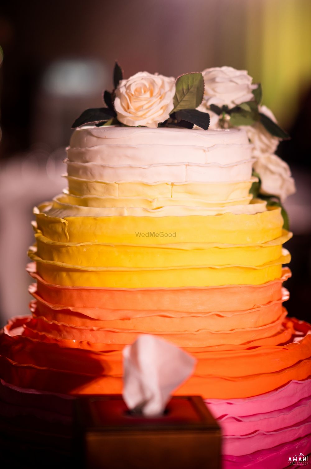 Photo of ombre cake with peach and orange shades
