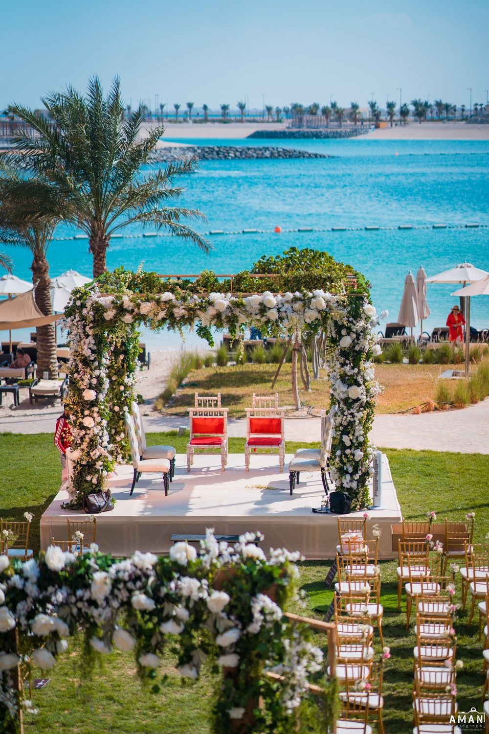 Photo of beachside floral mandap idea for an intimate wedding