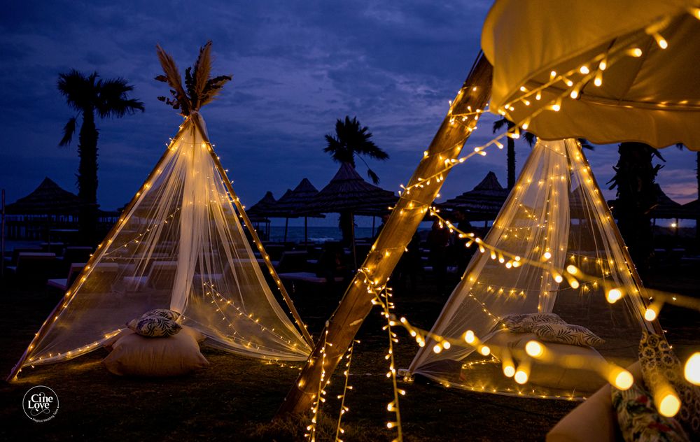 Photo of unique teepee tent decor with fairy lights