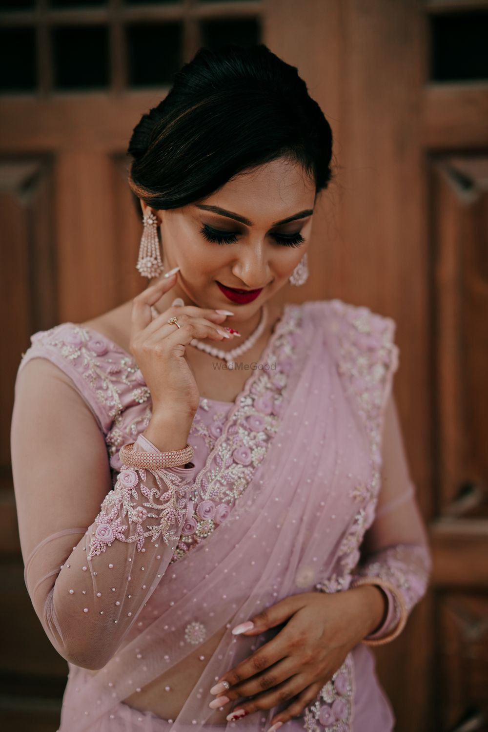 Photo of light pink bridal saree with lace work
