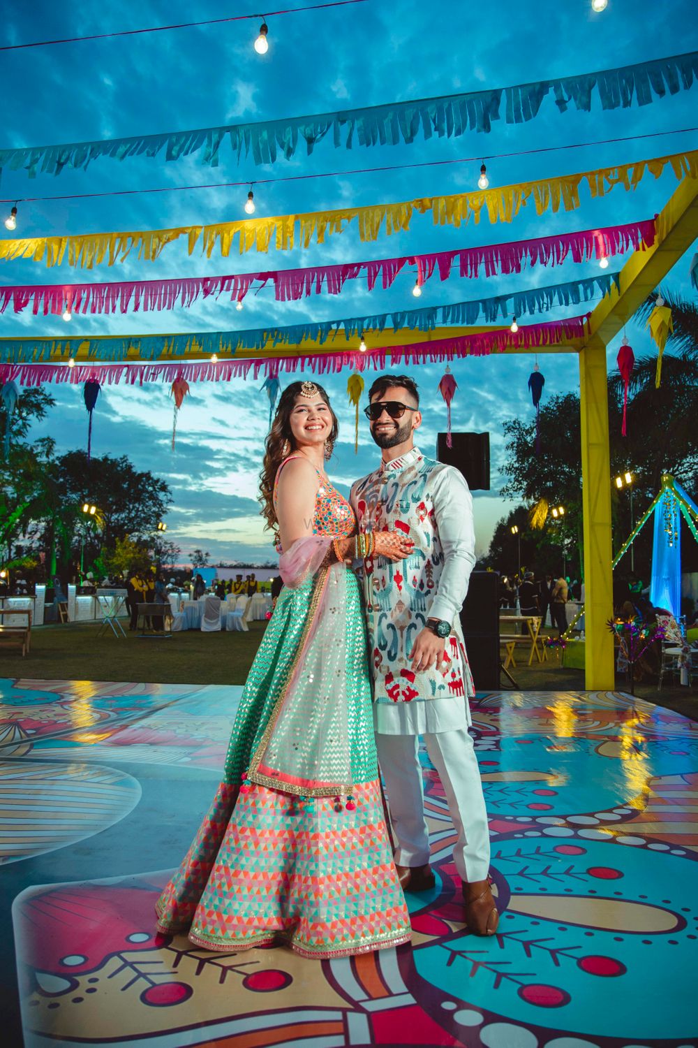 Photo of couple shot with vivid decor background