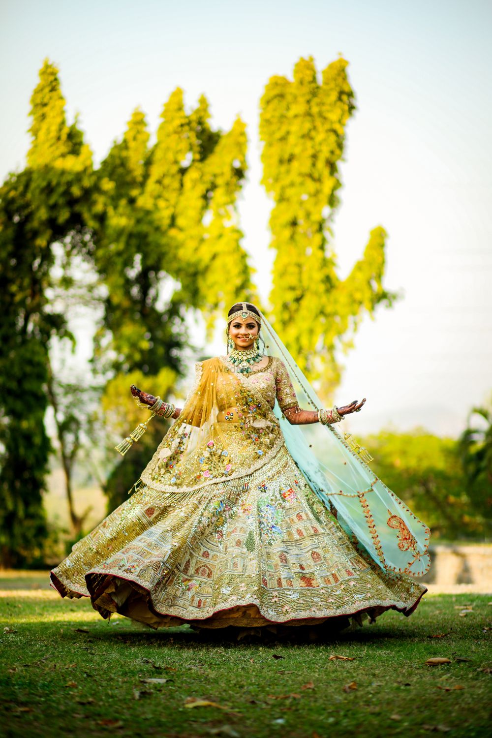 Photo of Twirling bride in a unique lehenga