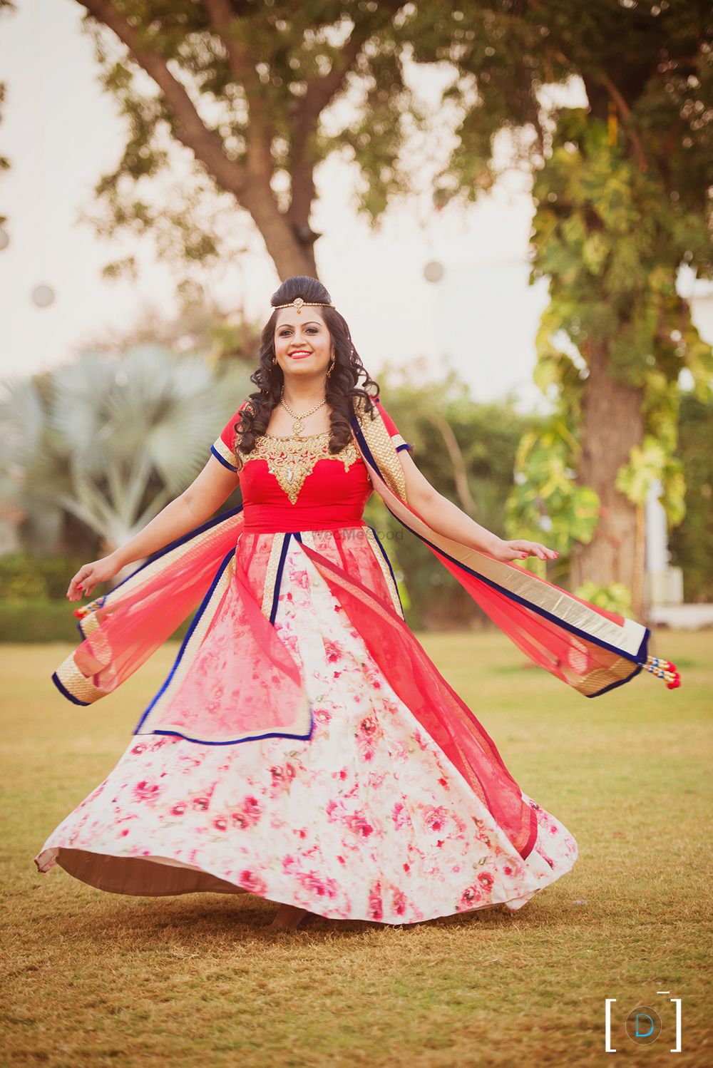 Photo of Red and White Floral Lehenga with Blue Border