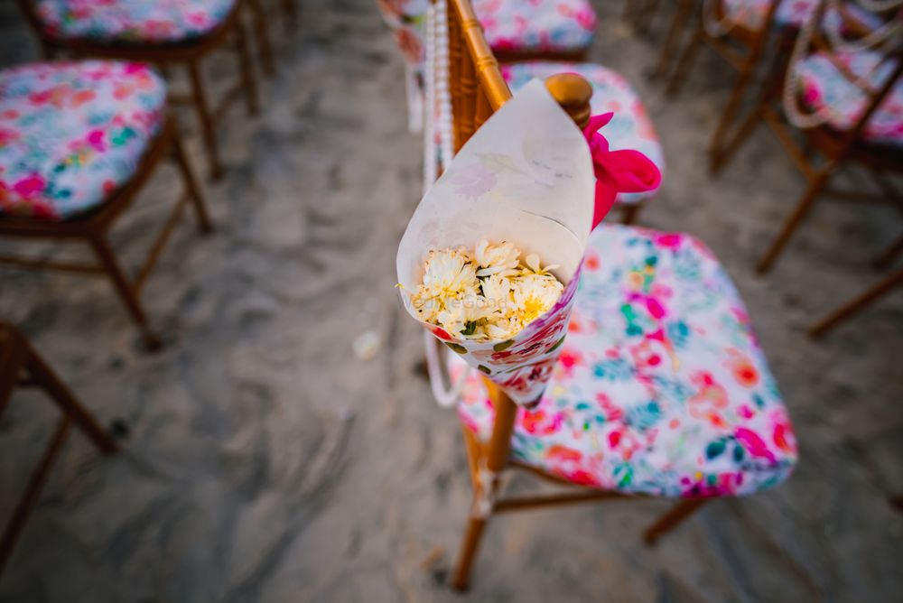 Photo of floral petals in cones for chair decor ideas