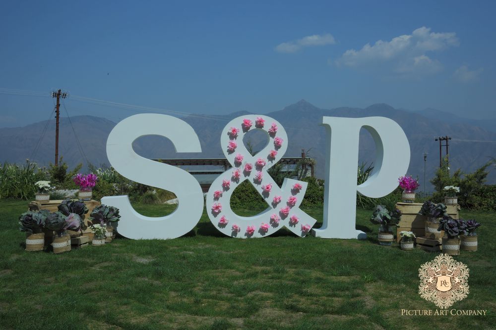 Photo of White and Pink Monogram Wooden Blocks in Decor