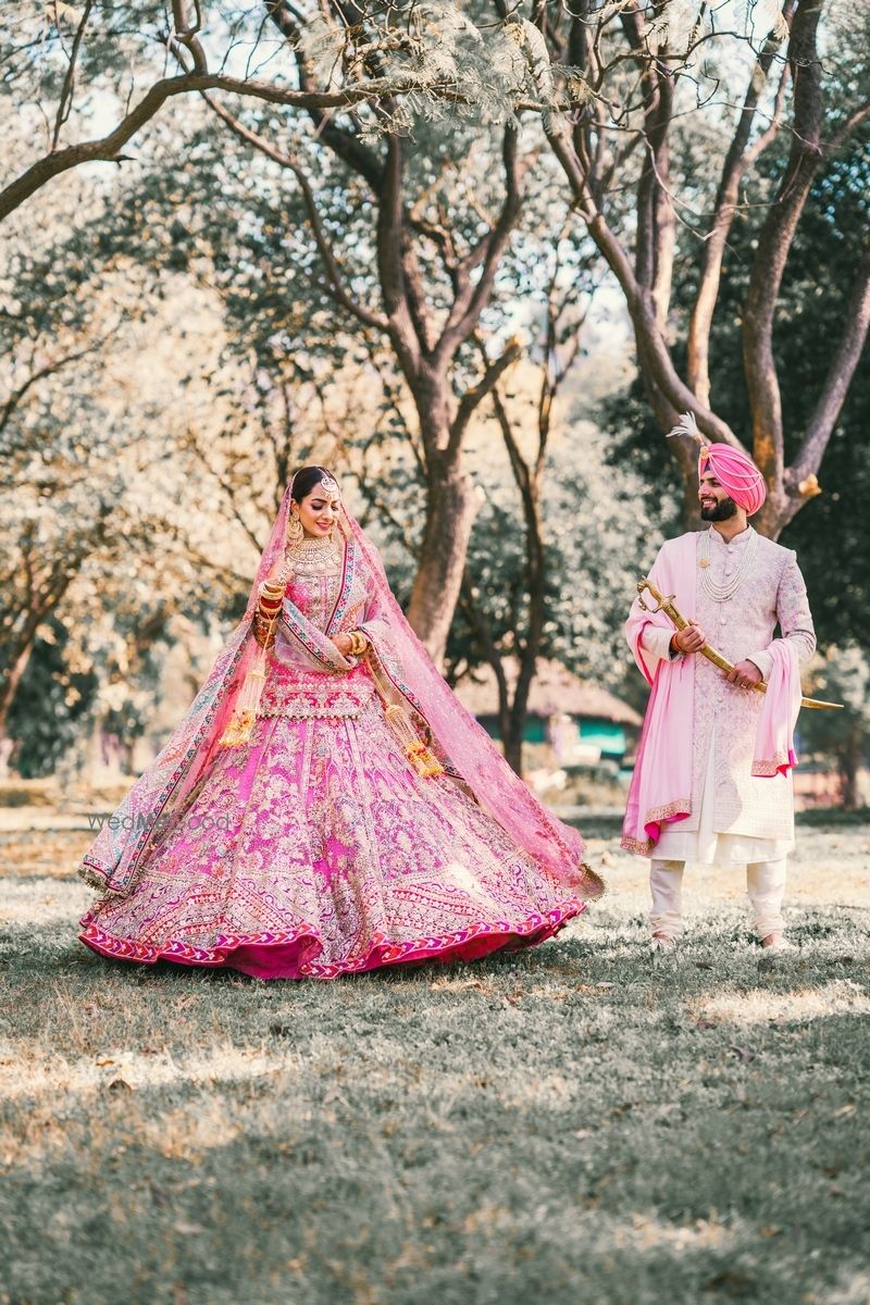 Photo of twirling bride in a couple shot