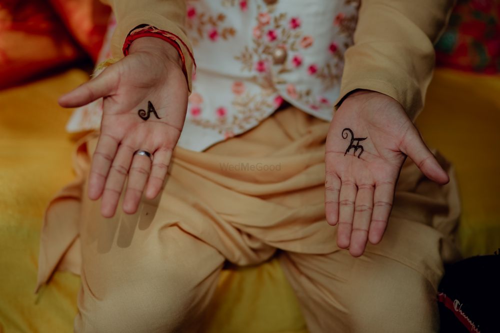 Photo of simple groom mehendi with initials