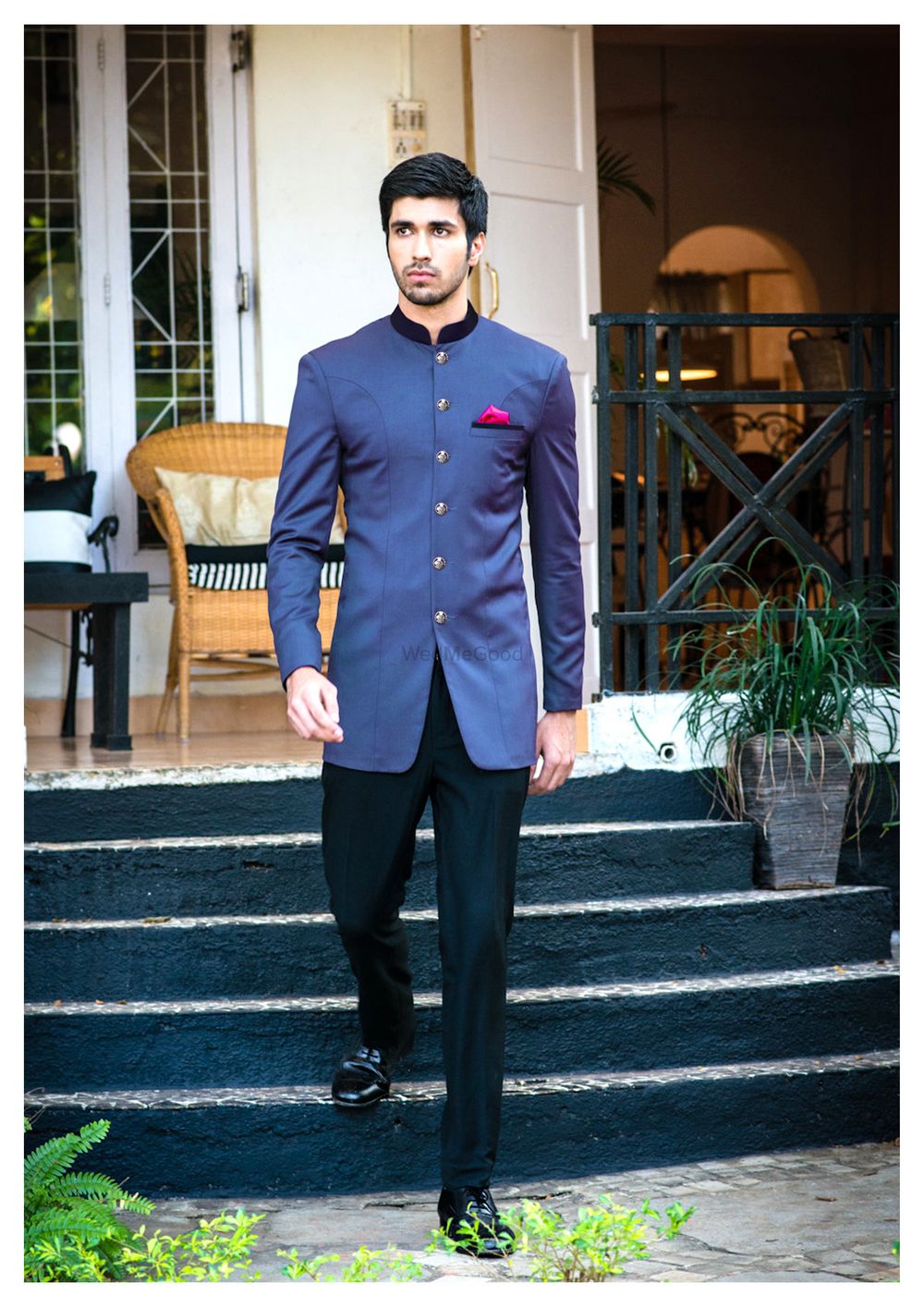 Photo of blue bandhgala with high neck and jodhpur trousers