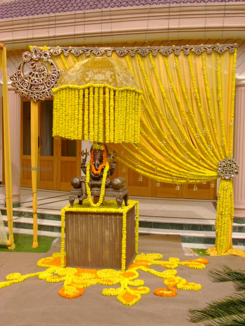 Photo of Genda Phool Drape Entrance Decor with God Statue