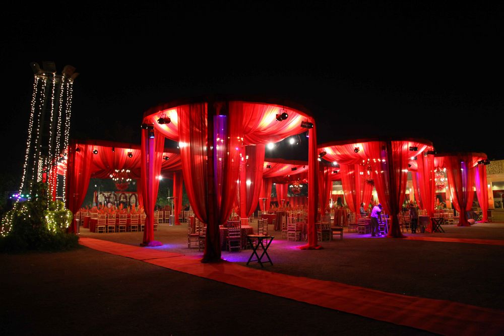 Photo of Canopy Table Setting in Red and Purple