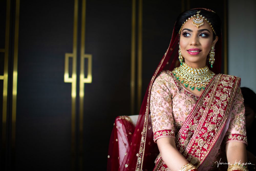Photo of lehenga with contrasting blouse and dupatta in light pink and maroon