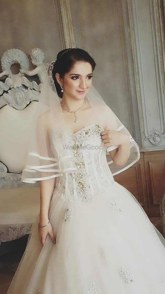 Photo of Bride in Christian Bridal Gown with Stone Work