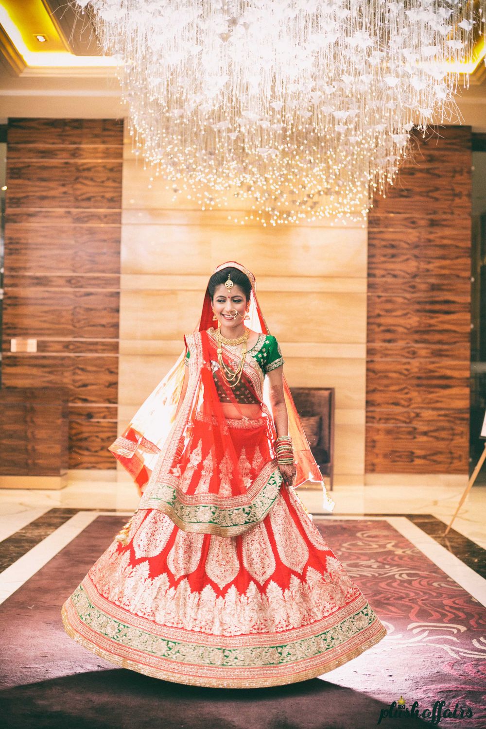 Photo of Red Bridal Lehenga with Green Blouse and Border