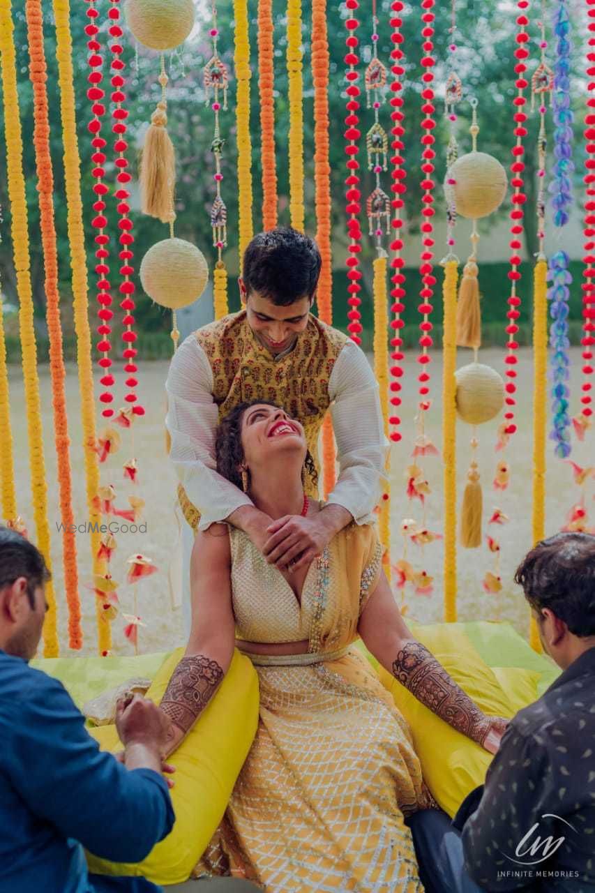 Photo of Candid couple shot on mehendi day