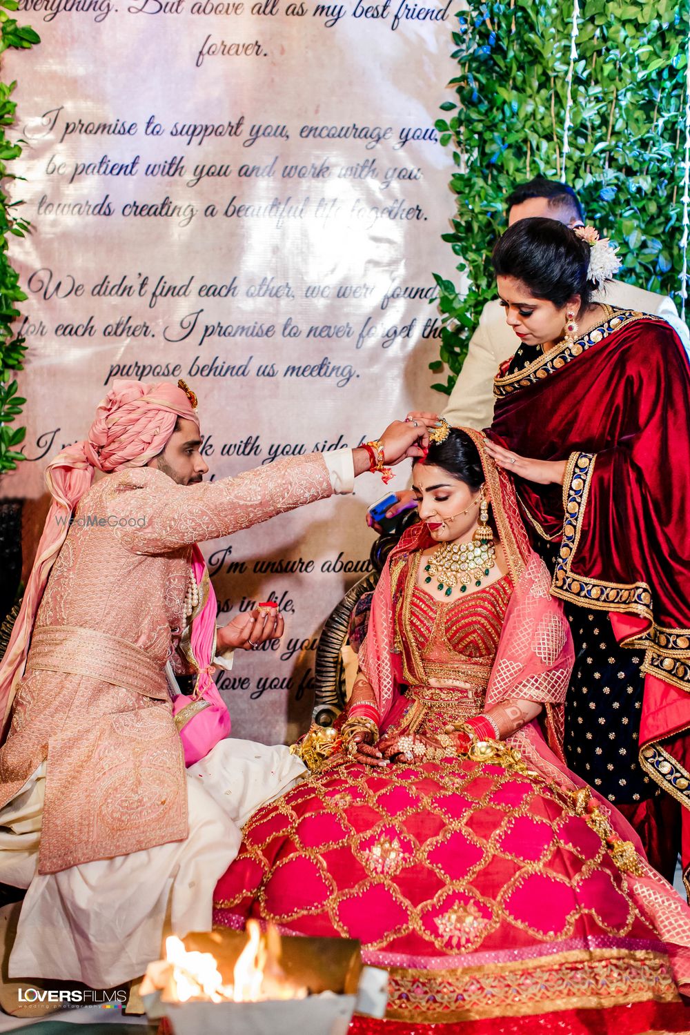 Photo of unique stage backdrop with couples vows