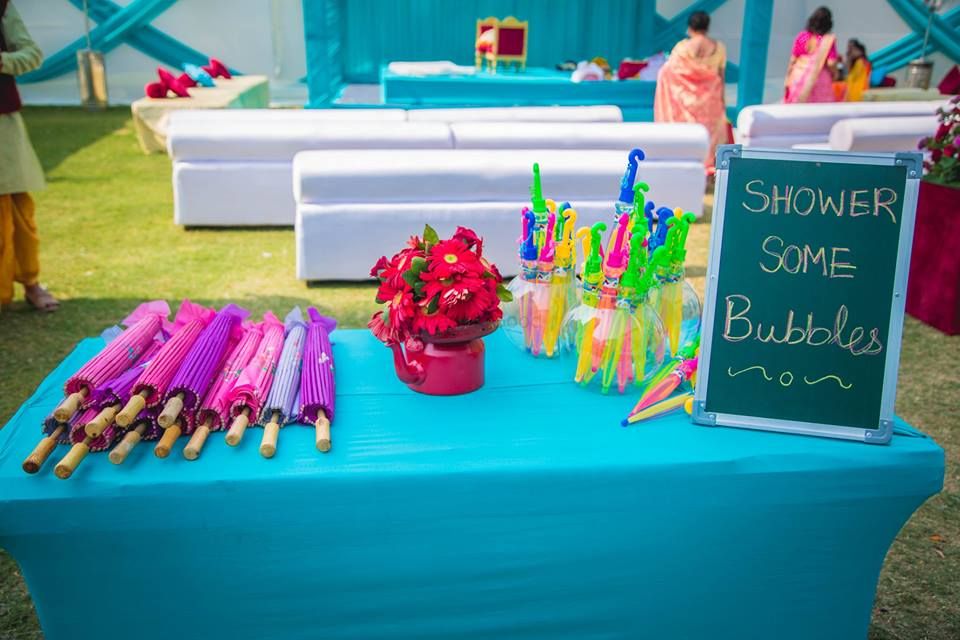 Photo of Umbrella and Bubble Stand for Guests