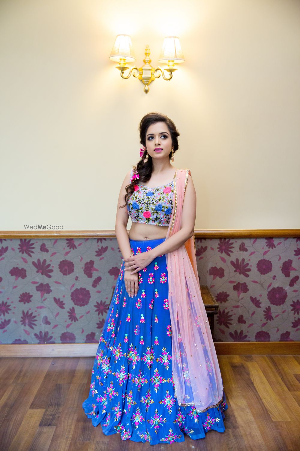 Photo of Blue and peach thread work lehenga