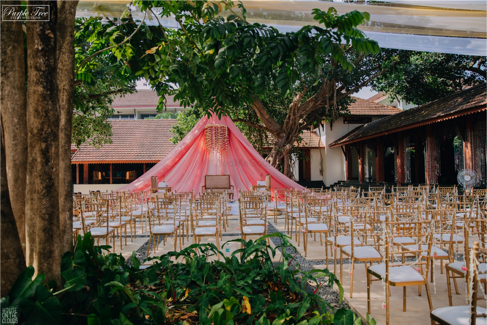 Photo of Tent style mandap under the tree.