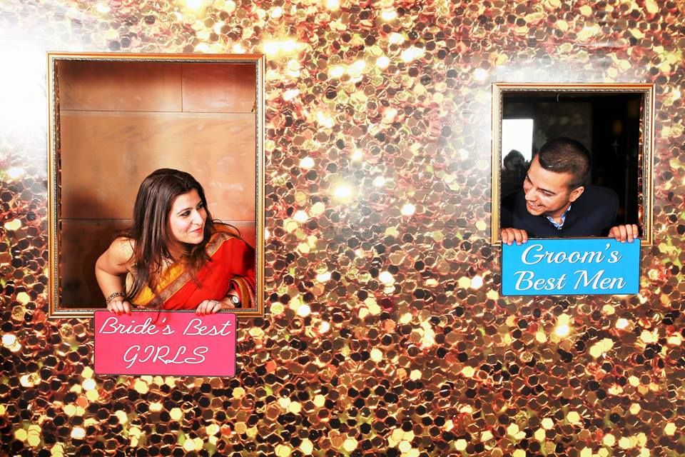 Photo of glitter cutout photobooth with wall