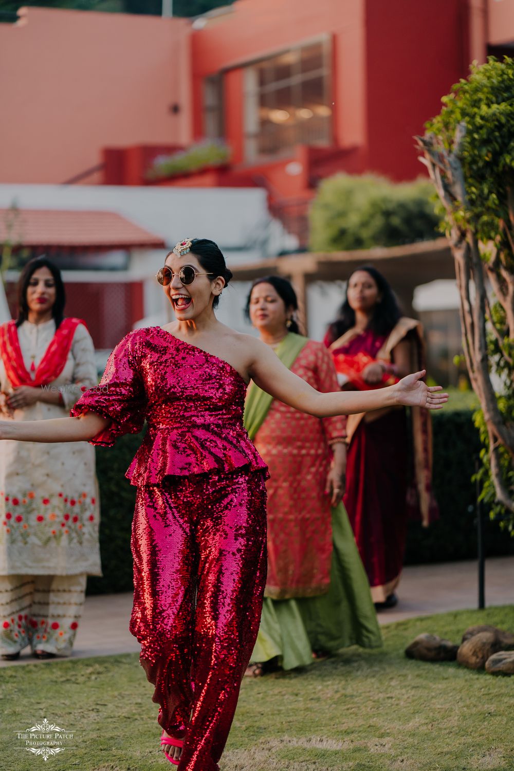 Photo of Bride wearing a sequinned co-ord set.