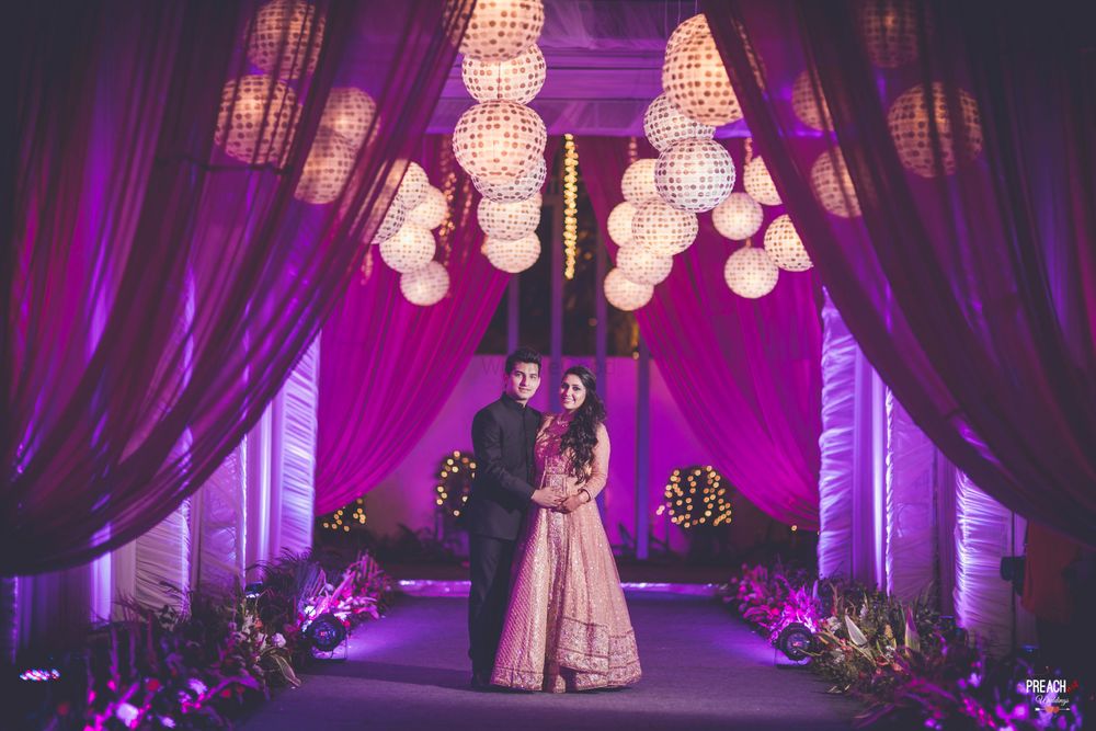 Photo of Purple Themed Entrance Decor with Round Paper Lamps
