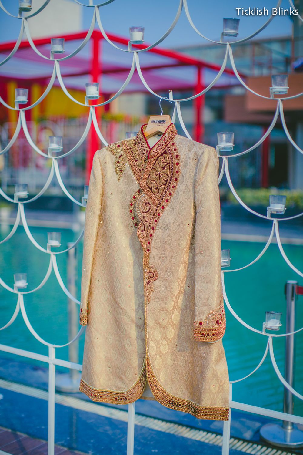 Photo of Beige Sherwani with Red Embroidery