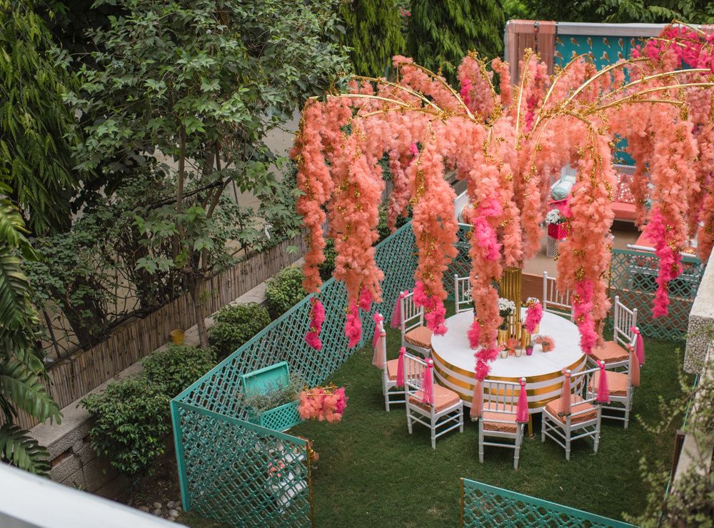 Photo of Coral and pink mehendi decor theme