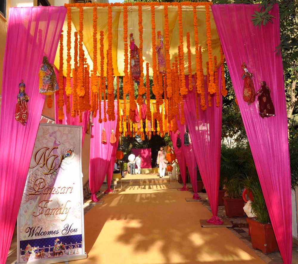 Photo of orange and pink rajasthani bhaat ceremony decor