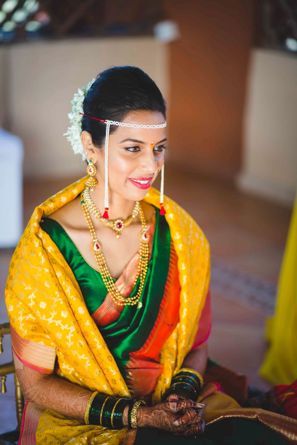 Photo of Marathi Bride in Yellow Green and Red Saree
