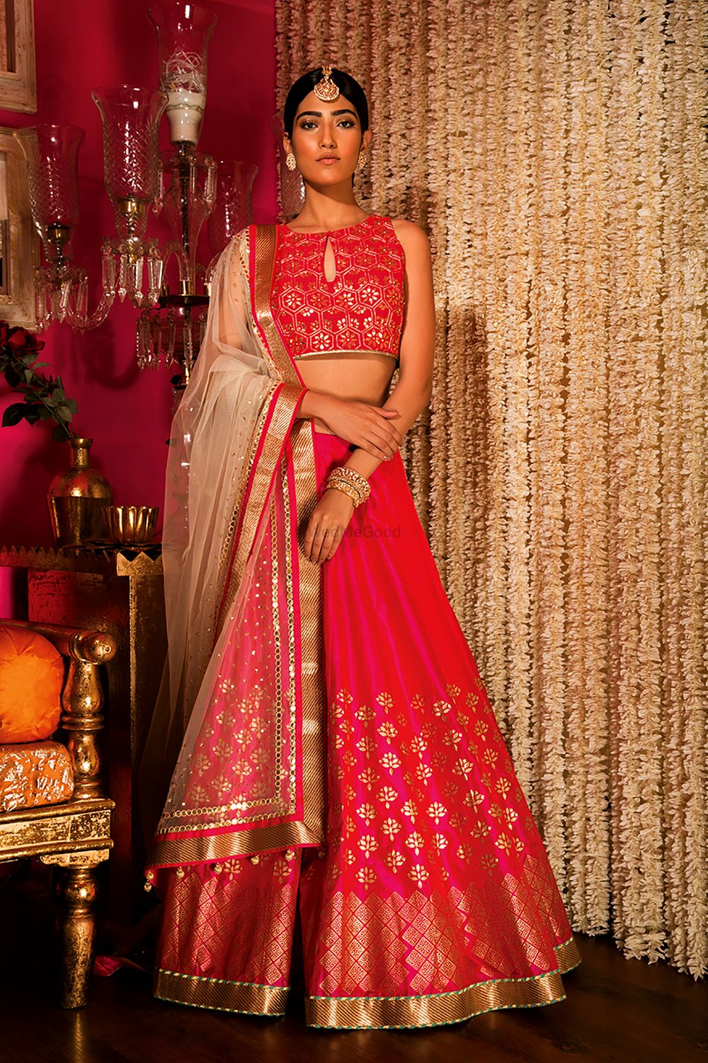 Photo of Red and Pink Lehenga with Gold Motifs