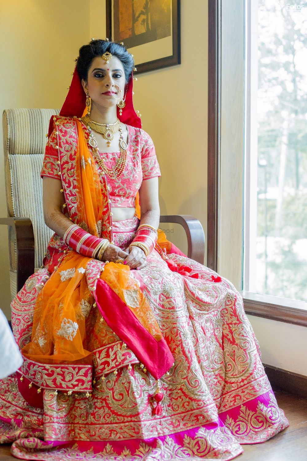 Photo of Pink and orange bridal lehenga
