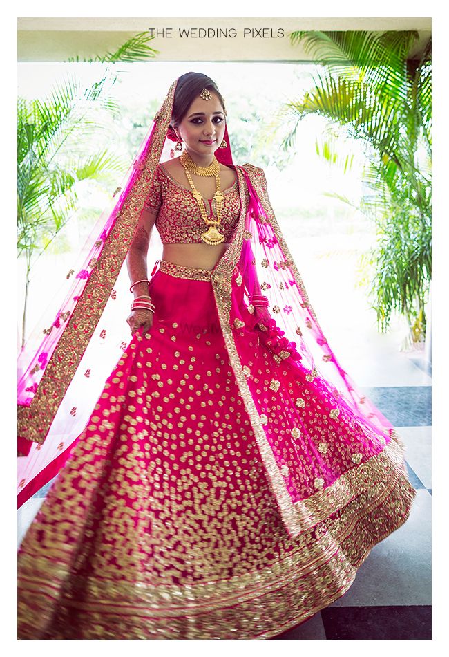Photo of Bright Pink and Gold Sequin Work Lehenga