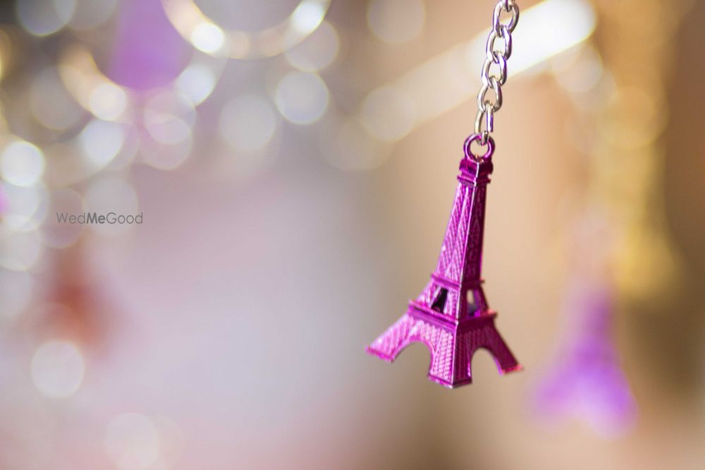 Photo of Miniature Eiffel Tower Hanging in Decor of NRI Wedding